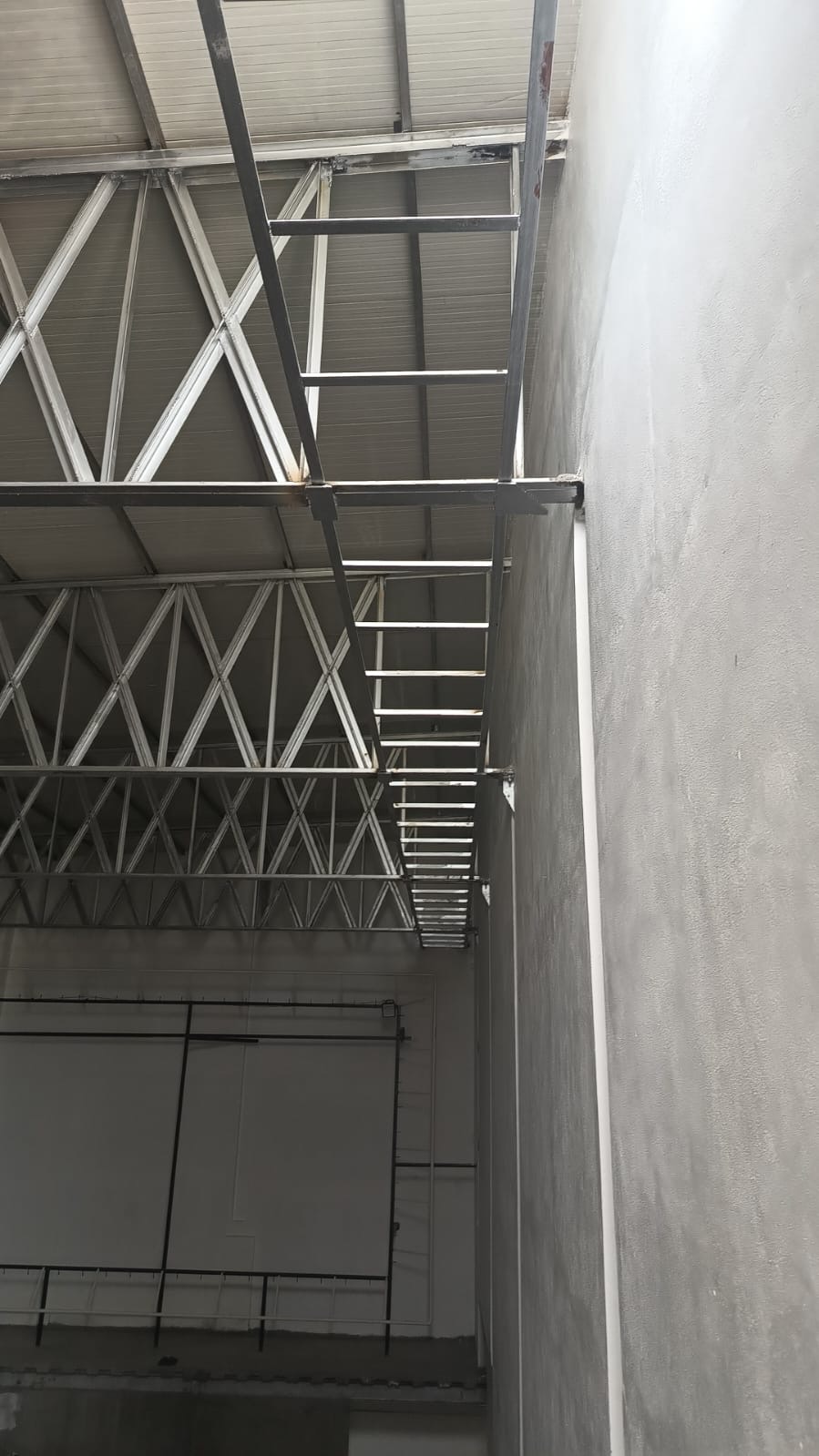 Balcony tier support columns and mezzanine framing